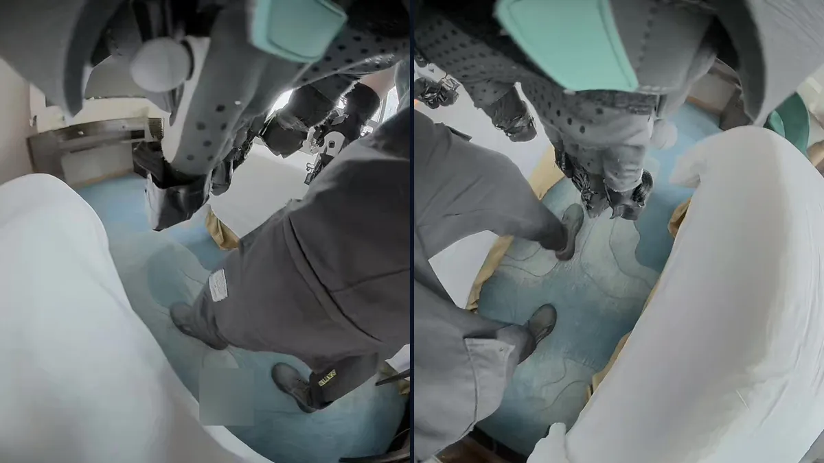 Two hand-mounted fisheye camera views during bed making